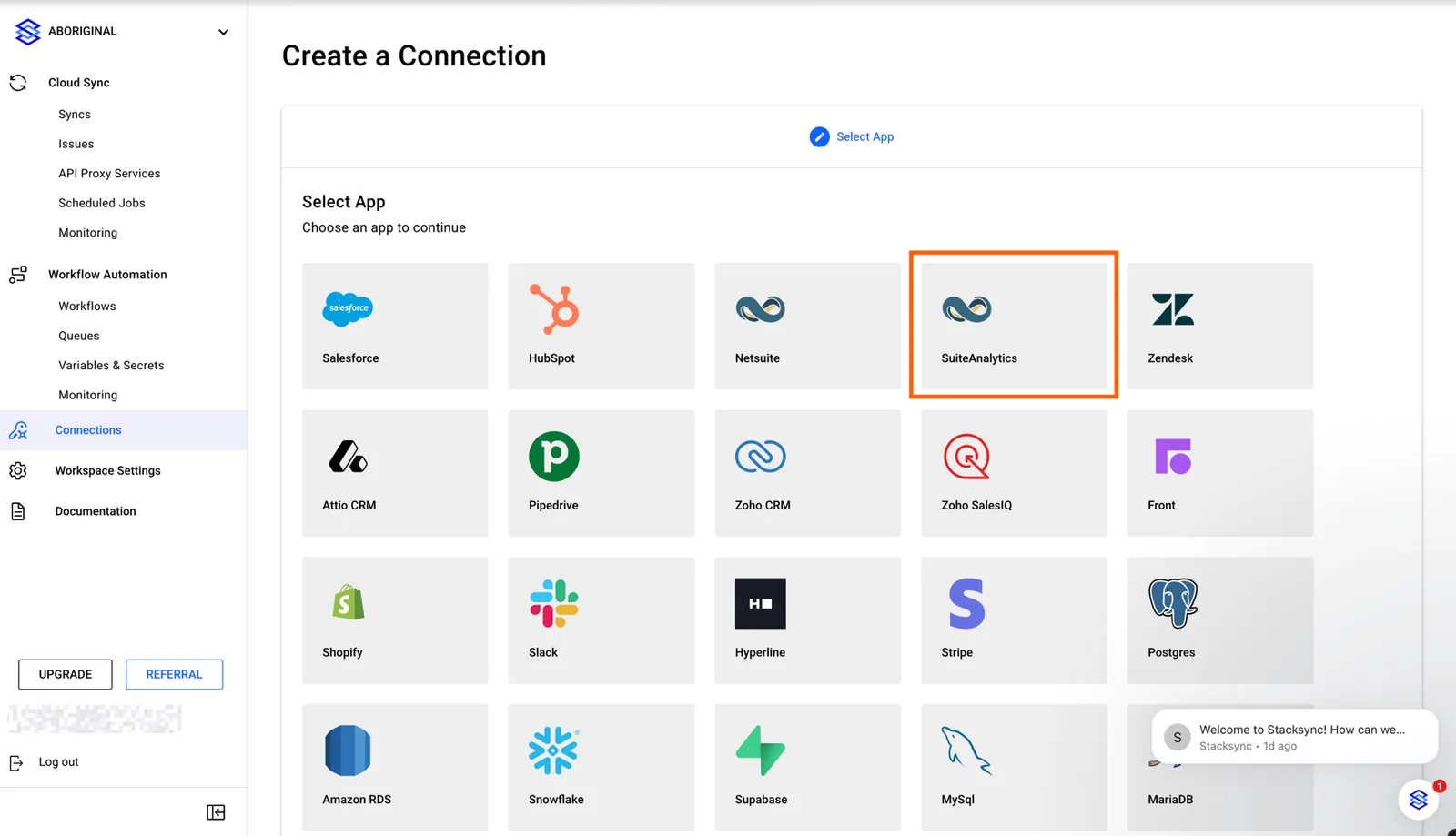 Stacksync "Create a Connection" page with the SuiteAnalytics app tile highlighted next to NetSuite.
