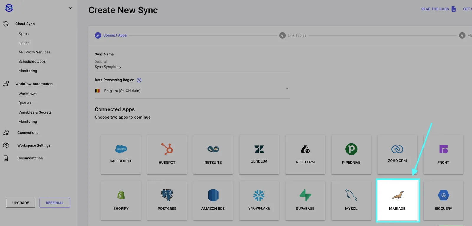 Stacksync "Create New Sync" Connect Apps step with an arrow pointing to the MariaDB tile.