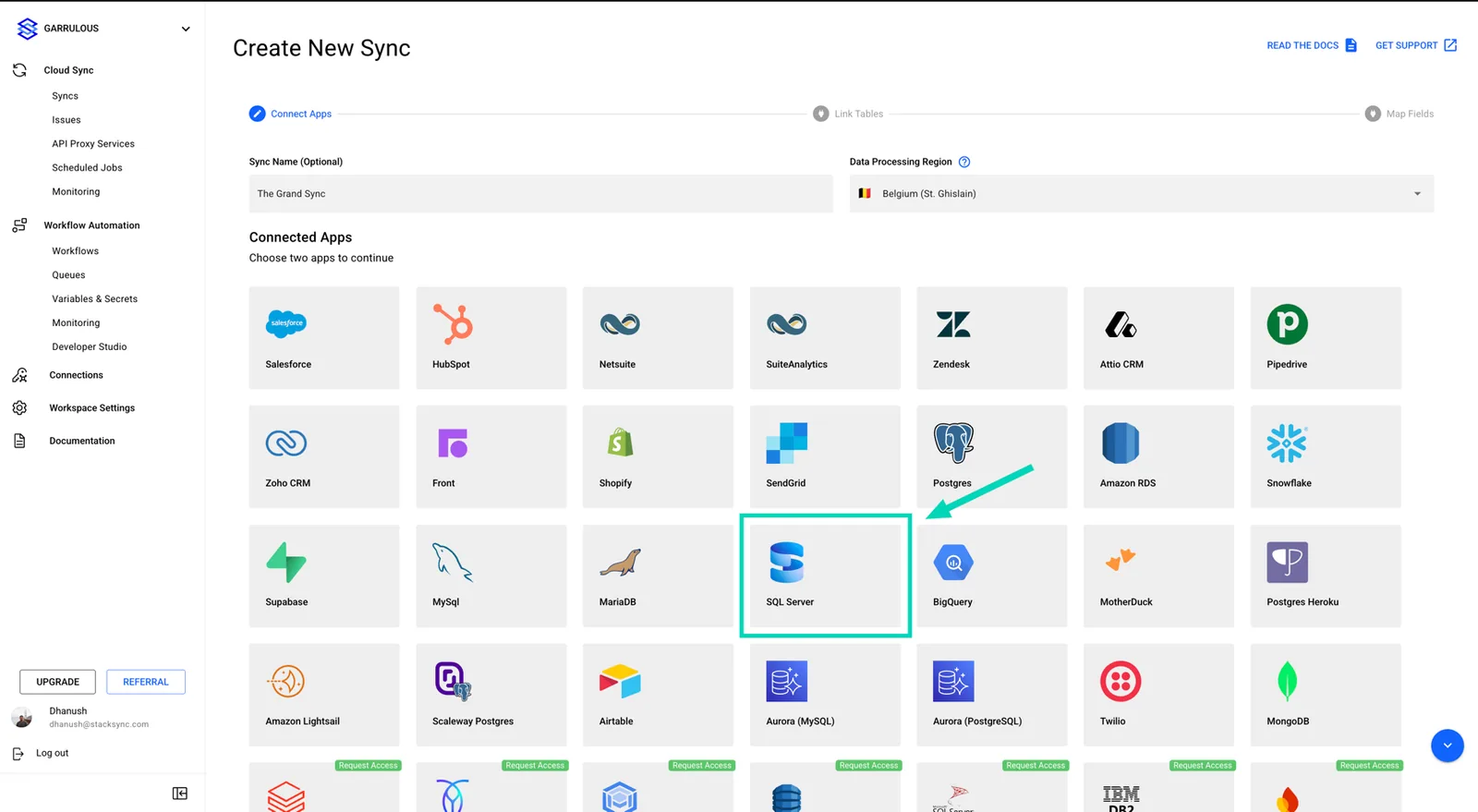 Stacksync Create New Sync page, Connect Apps step, with an arrow pointing to the SQL Server tile.