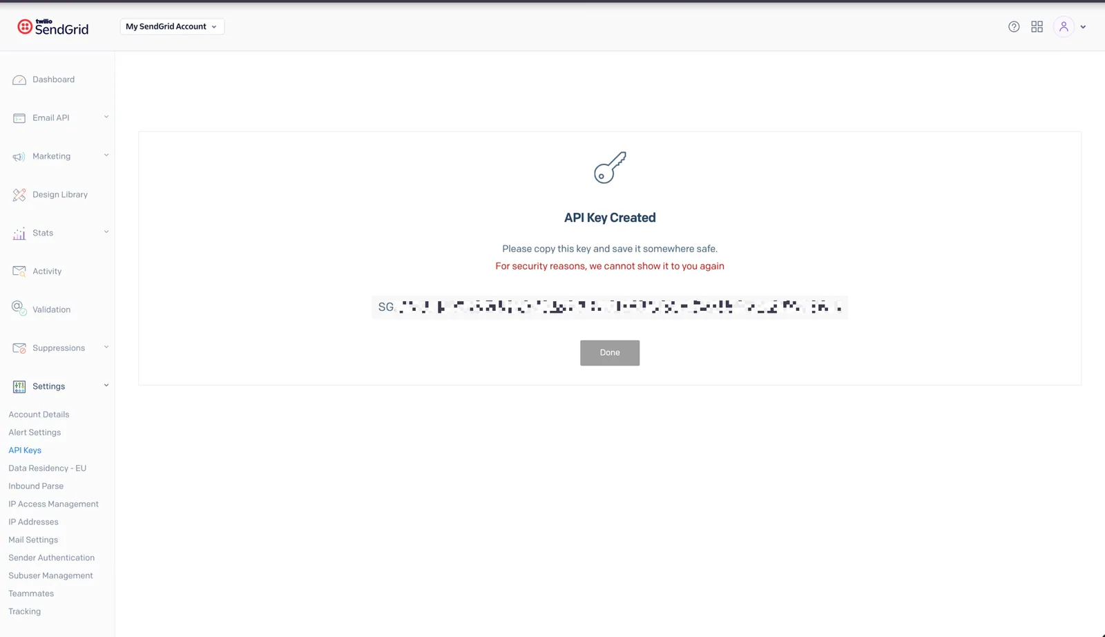 SendGrid "API Key Created" screen showing a redacted key starting with "SG" and a warning to copy it now.