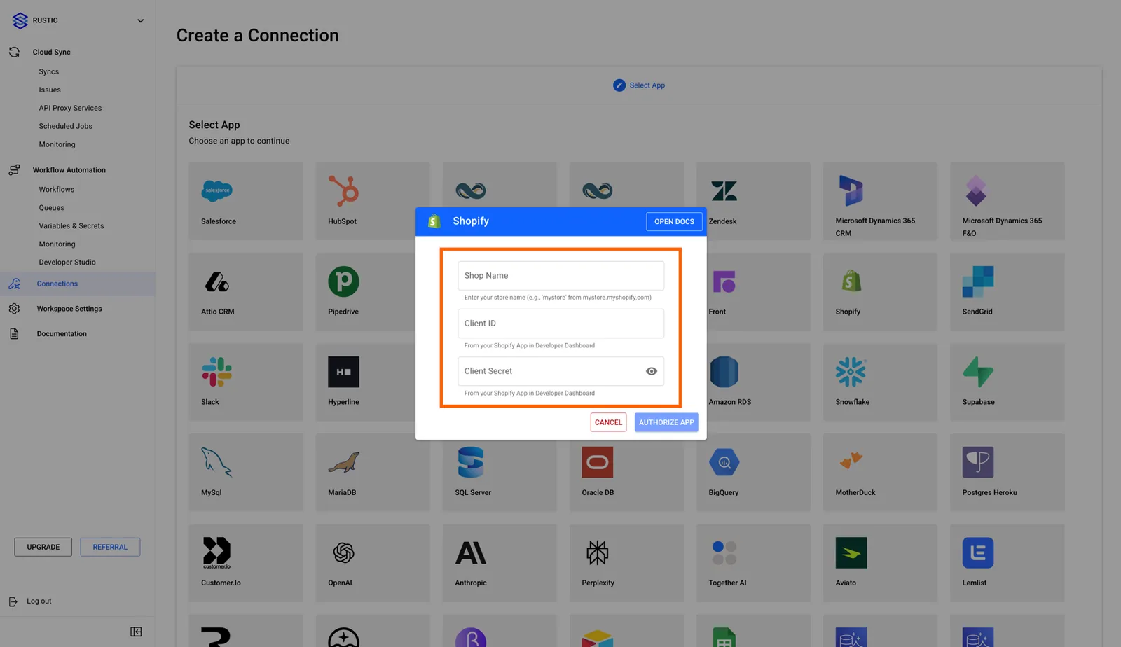 Stacksync Shopify connection dialog with Shop Name, Client ID and Client Secret fields highlighted and an "Authorize App" button.