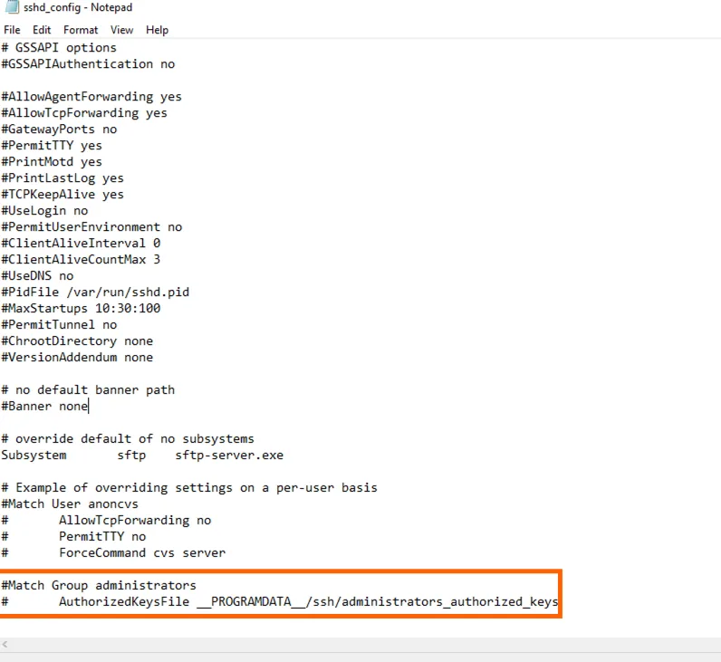 sshd_config in Notepad with the last "Match Group administrators" and AuthorizedKeysFile lines commented out and highlighted.