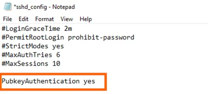 sshd_config open in Notepad with the line "PubkeyAuthentication yes" uncommented and highlighted.