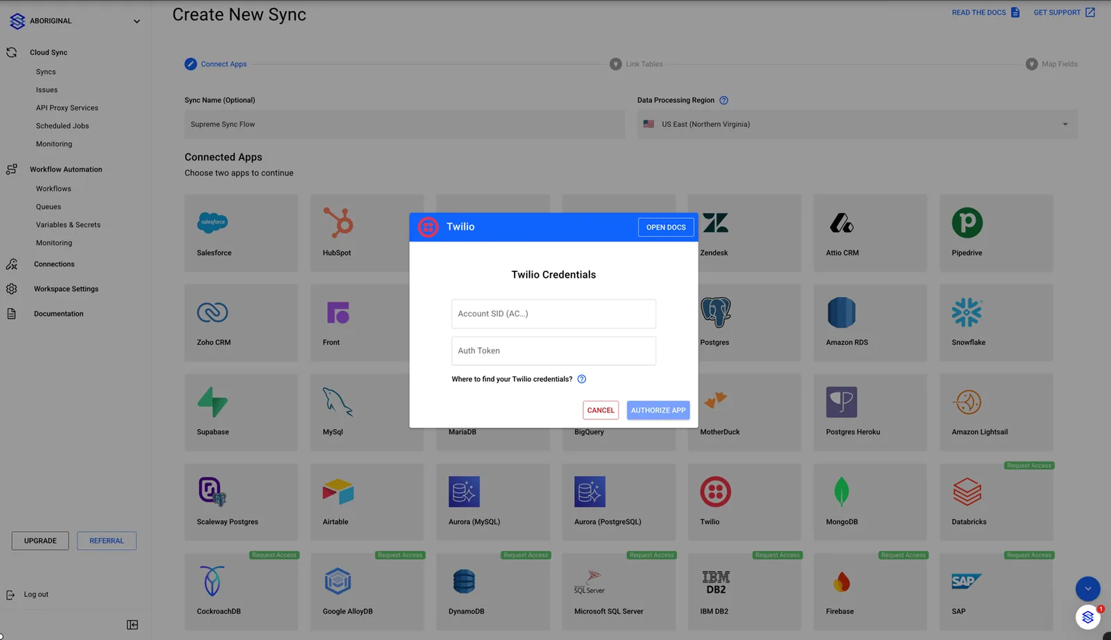 Stacksync Twilio Credentials dialog with Account SID and Auth Token fields and an "Authorize App" button.