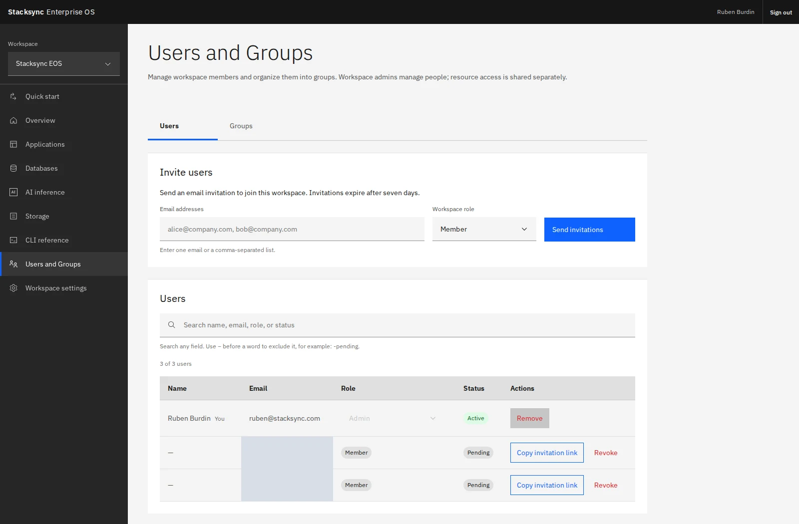 The Users tab combines workspace invitations with active and pending membership. Additional email addresses are concealed in this screenshot.
