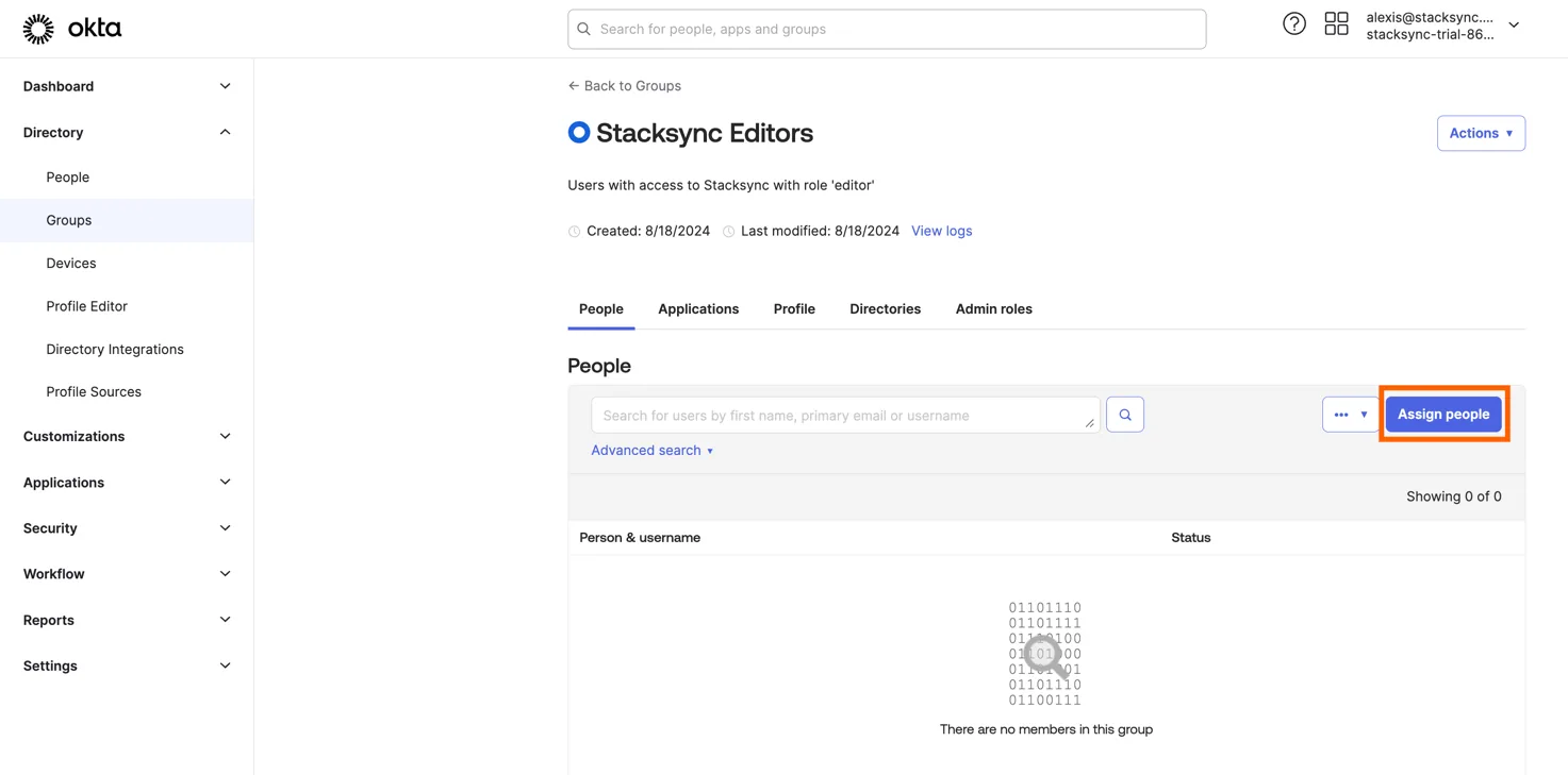 Okta "Stacksync Editors" group People tab with the "Assign people" button highlighted.