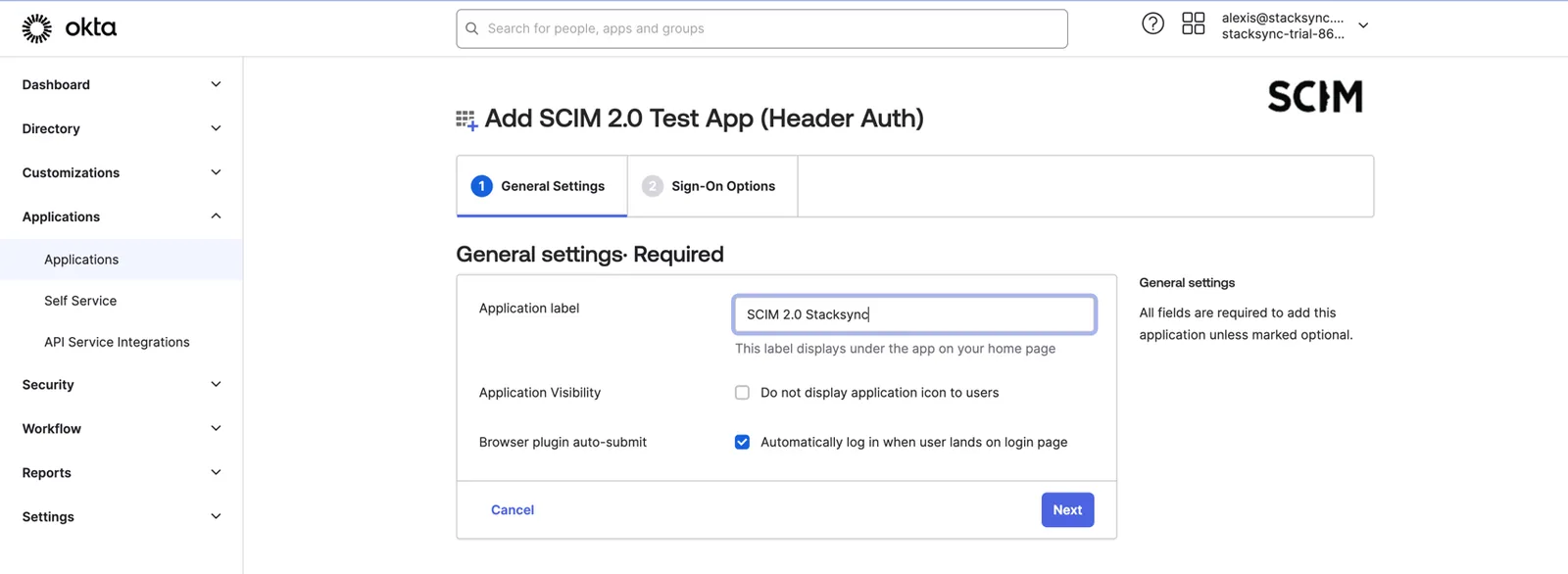 Okta "Add SCIM 2.0 Test App (Header Auth)" General Settings with Application label set to "SCIM 2.0 Stacksync" and a Next button.