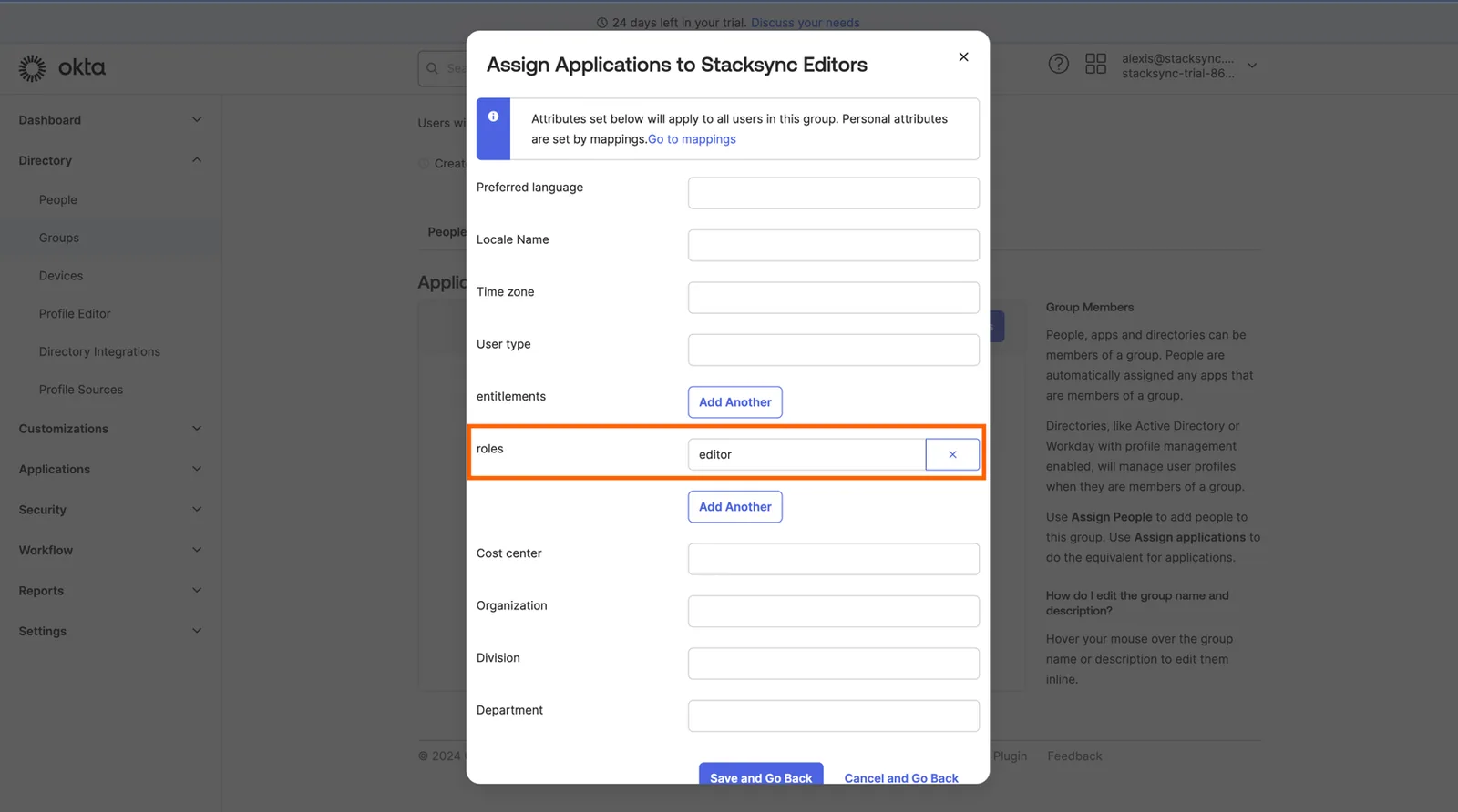 Okta "Assign Applications to Stacksync Editors" dialog with the roles attribute set to "editor" highlighted.