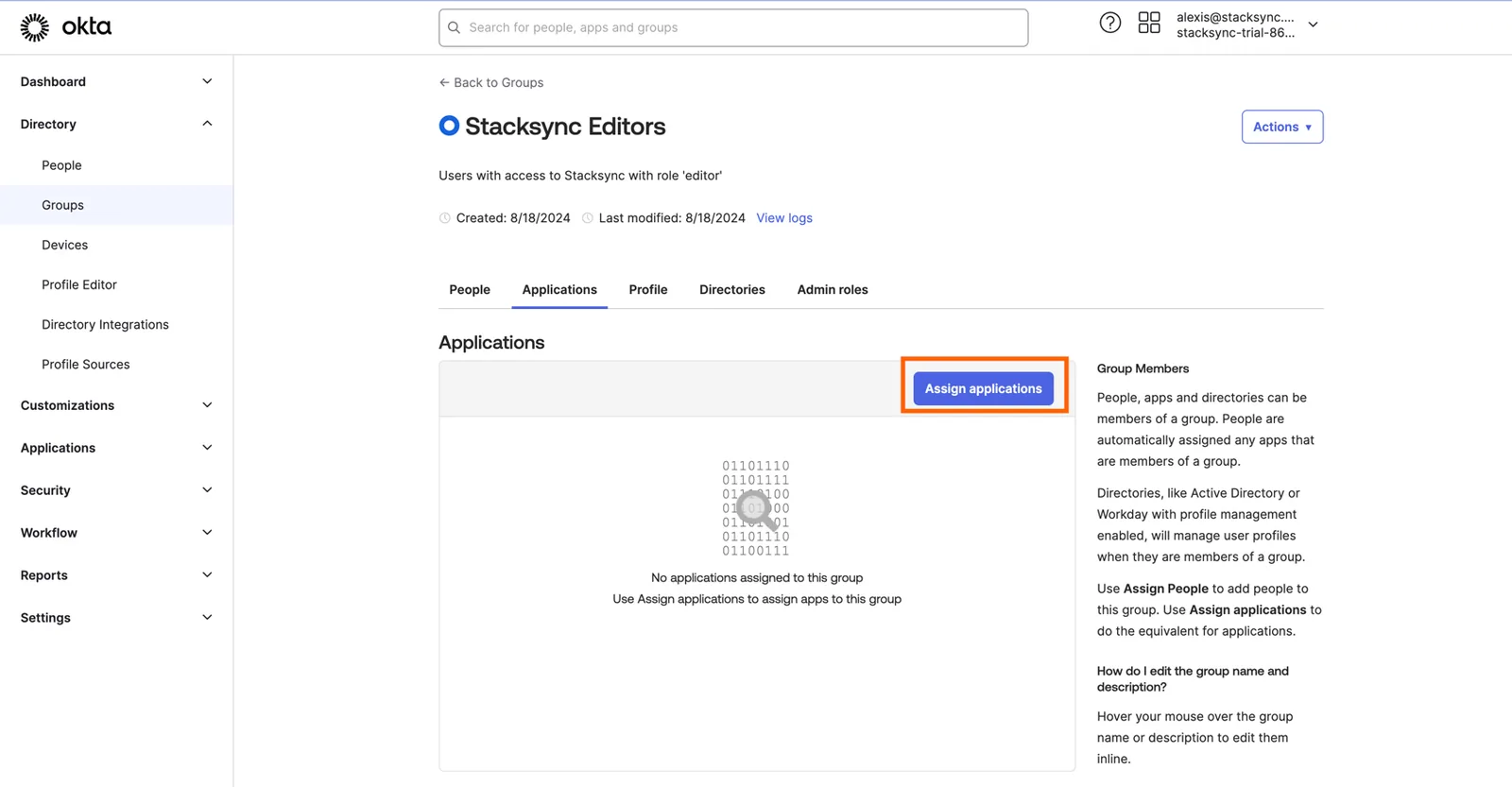 Okta "Stacksync Editors" group Applications tab with the "Assign applications" button highlighted.