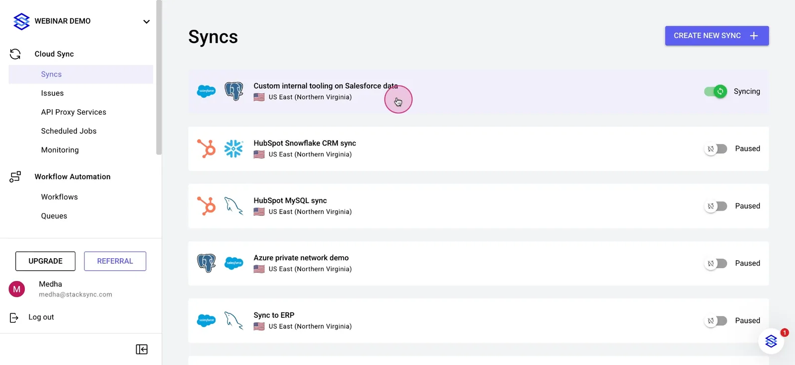 Stacksync Syncs dashboard listing syncs such as Salesforce-Postgres "Custom internal tooling on Salesforce data", with one being clicked.